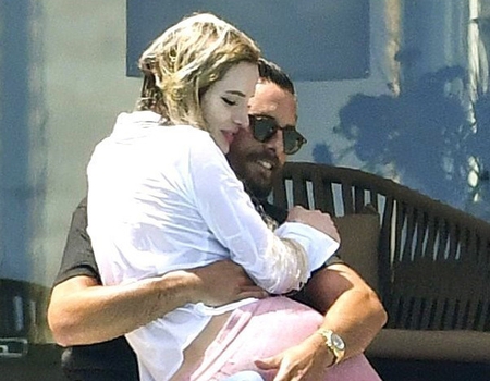 Scott Disick and Bella Thorne Get Close in Cannes With Poolside Kisses